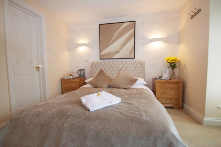 double bed in bed and breakfast style ensuite bedroom